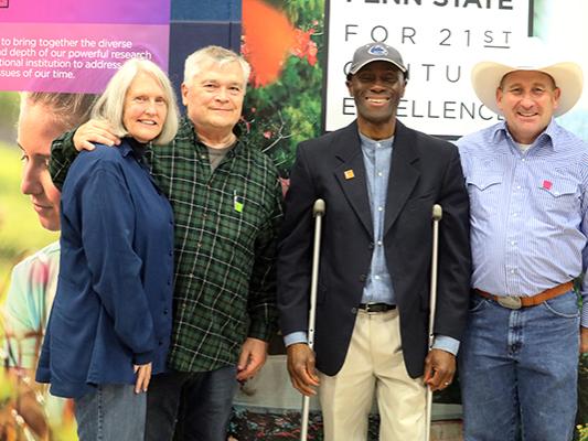 President Eric and Molly Barron with Chancellor Francis K. Achampong and Director of Development Randall Ackerman.