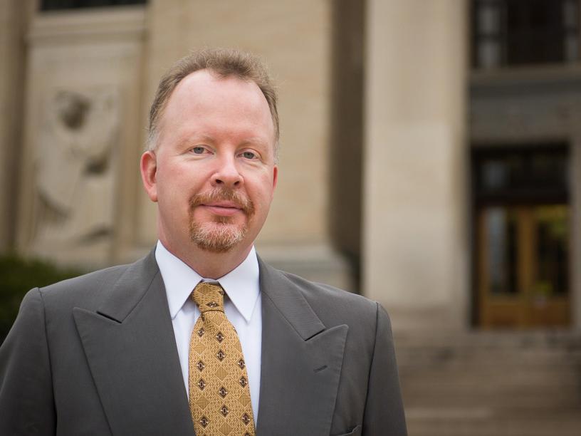 Mark Brennan stands on the Penn State University Park campus.