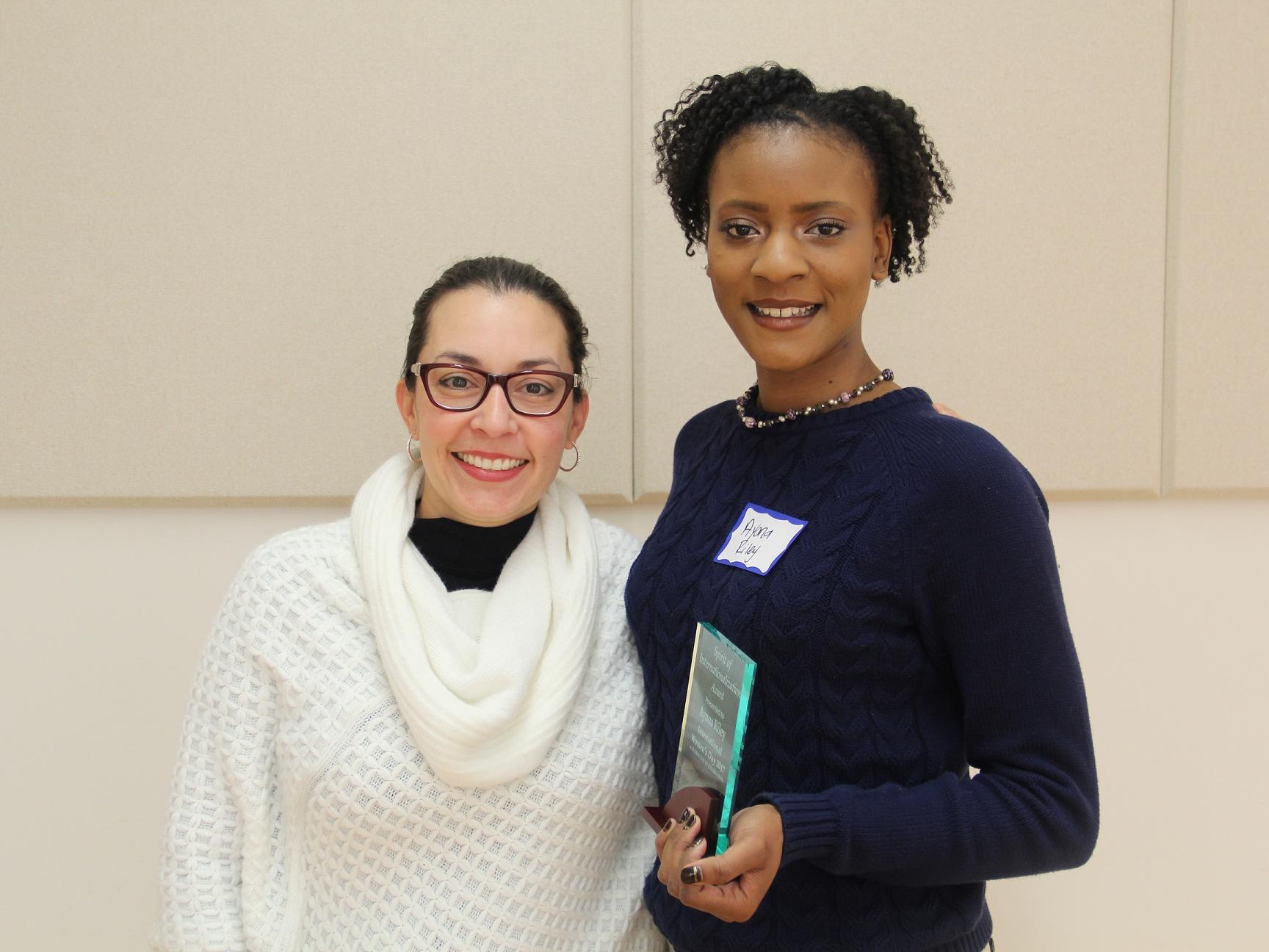 Claudia Prieto and Ayona Riley at the Spirit of Internationalization Award ceremony.
