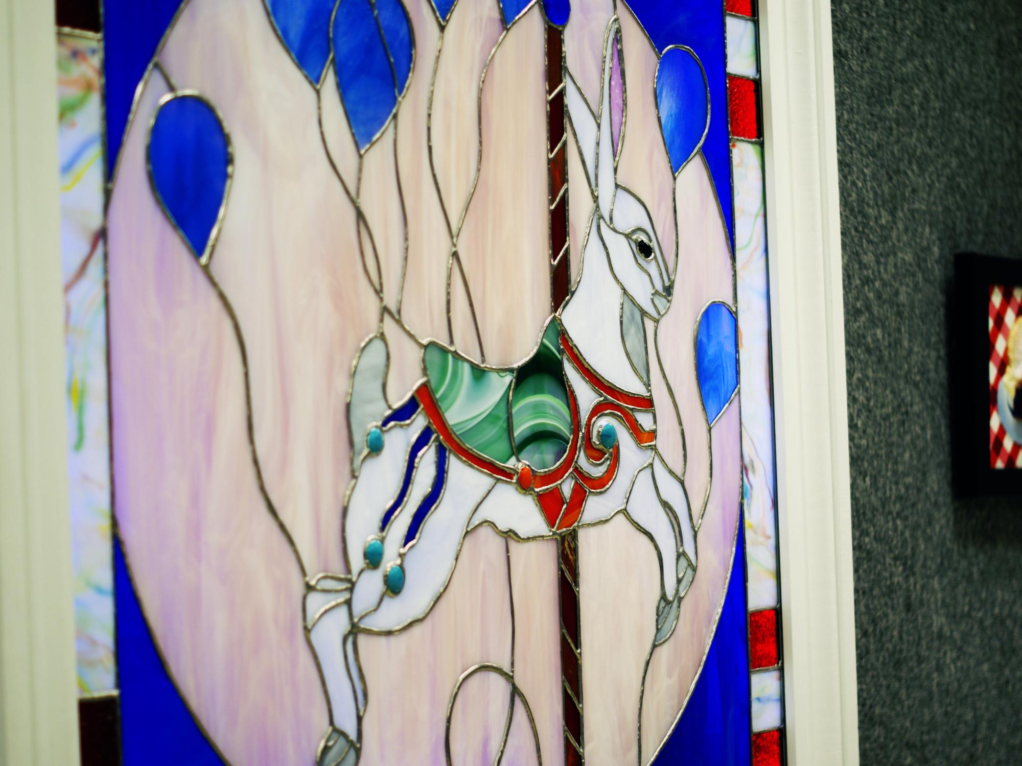 "Carousel Rabbit" stained glass art by Prissy Pakulski