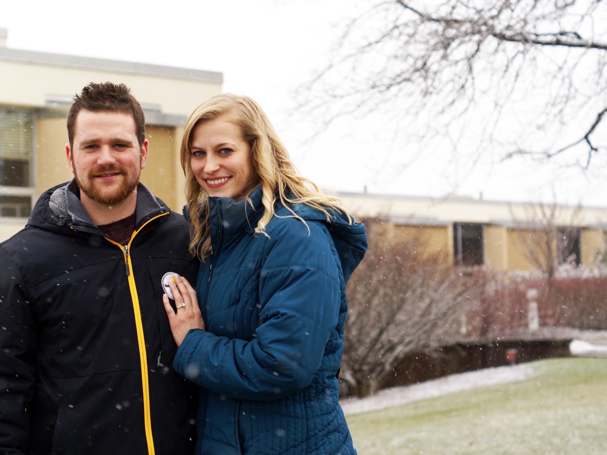 Greg Zyhowski and Ashley Myerski stand in front of New Kensington campus