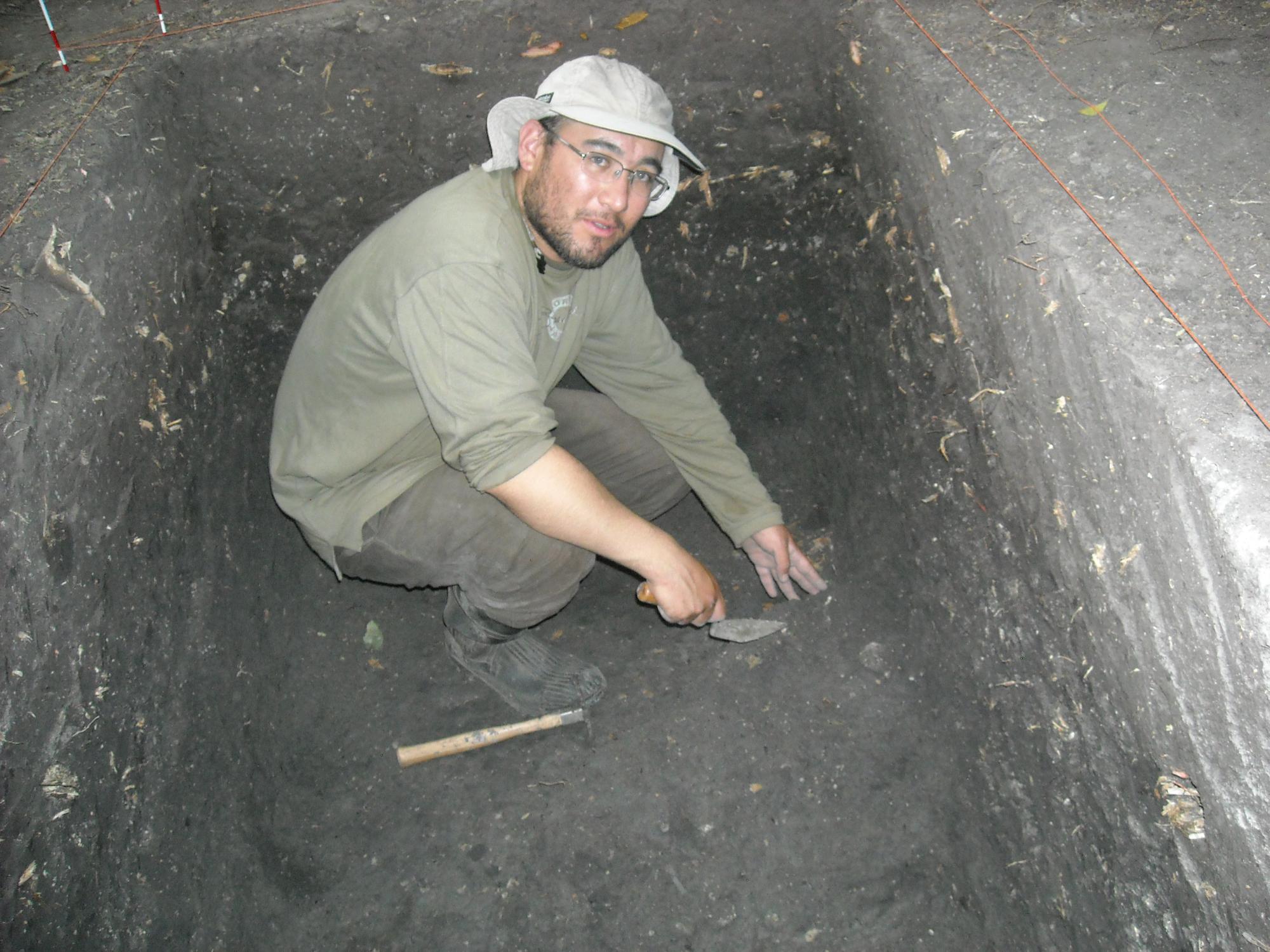 Dr. José Capriles excavating in a square pit