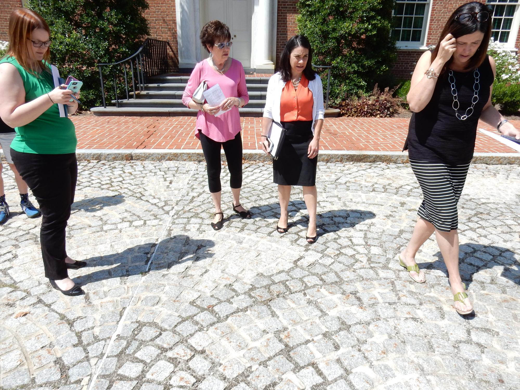 Students examine the forecourt at the Pennsylvania Governor’s Residence in Harrisburg.