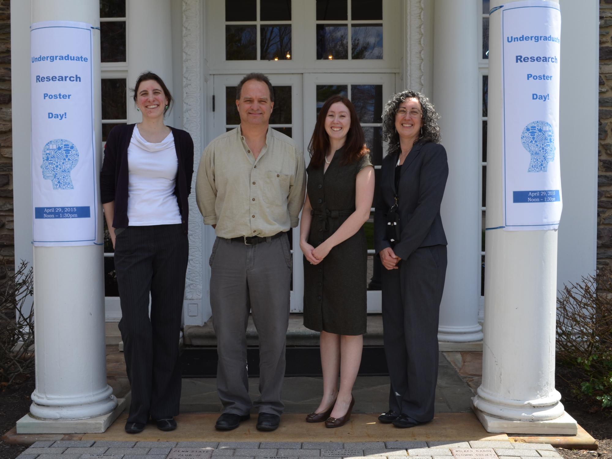 faculty pose outside Wilkes-Barre's Hayfield House