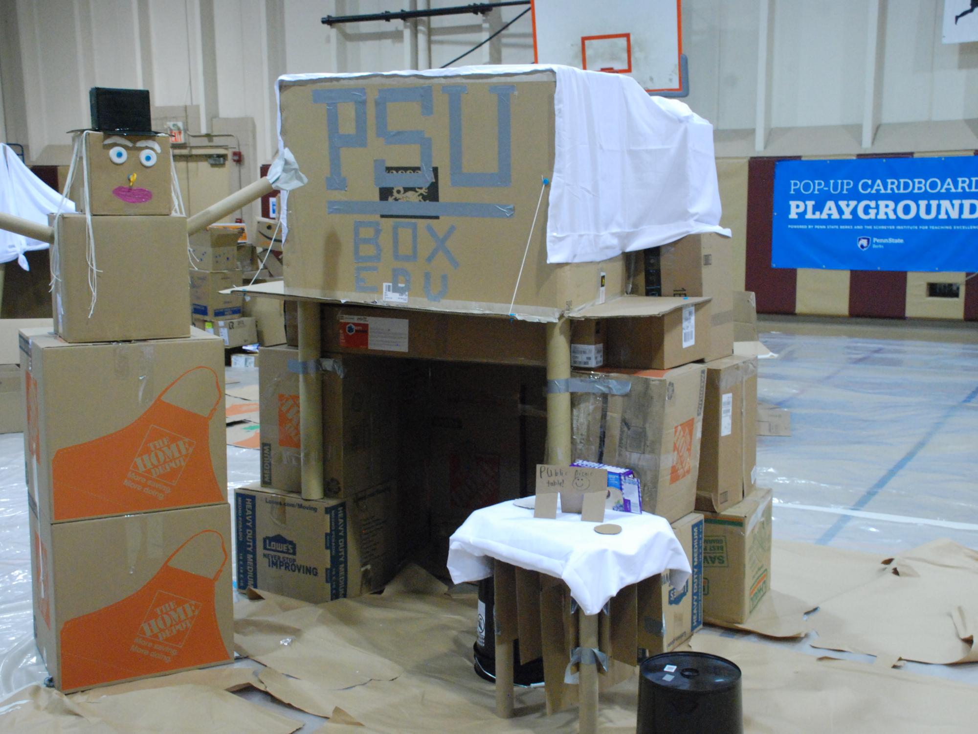 Cardboard box fort and snowman