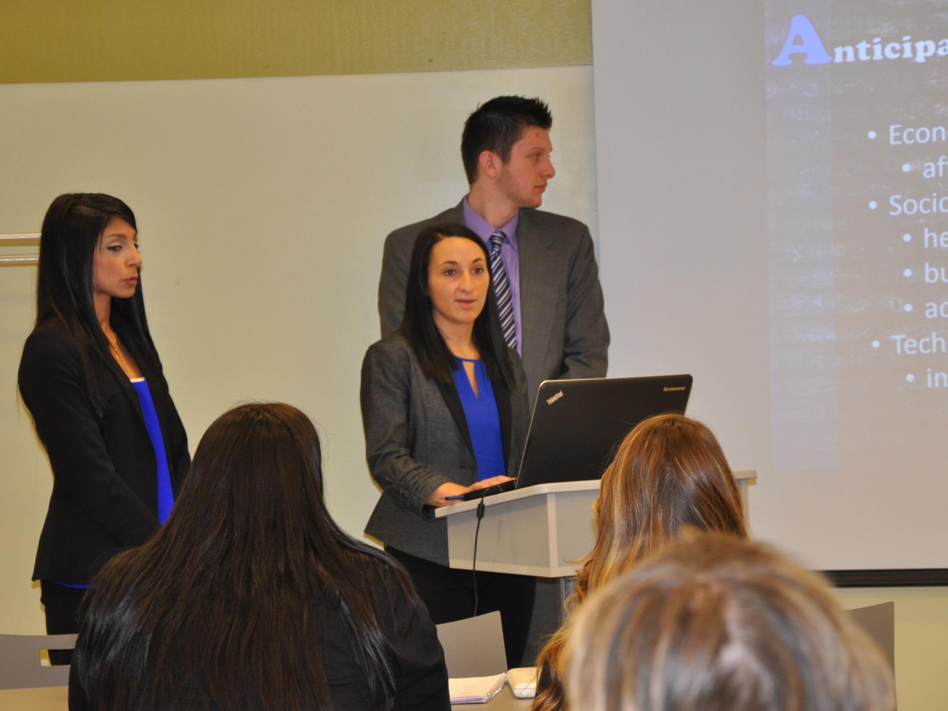 female student at podium