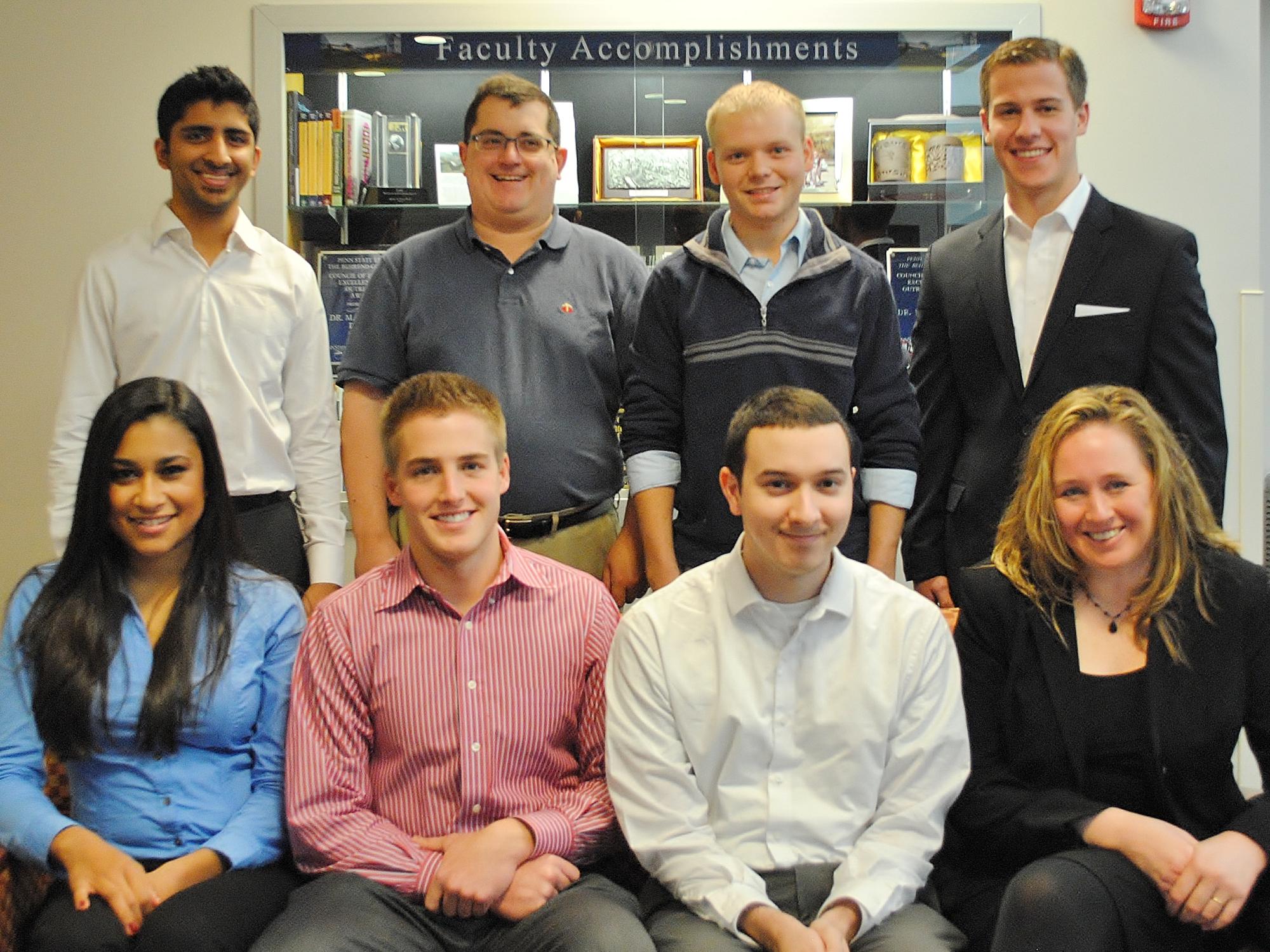 EIght students have won scholarships to prepare for and take the Chartered Financial Analyst exams.