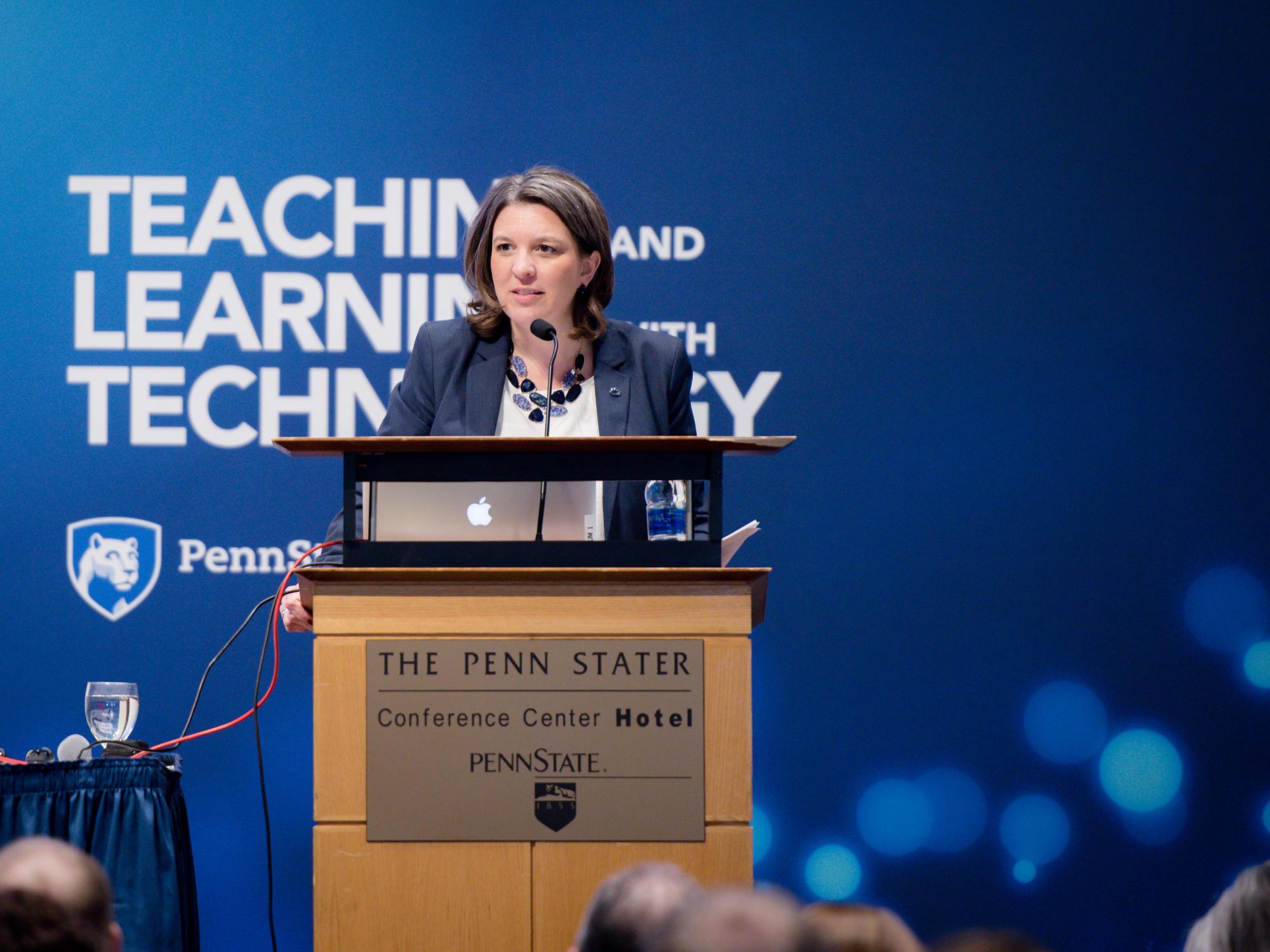 Jennifer Sparrow speaks at podium