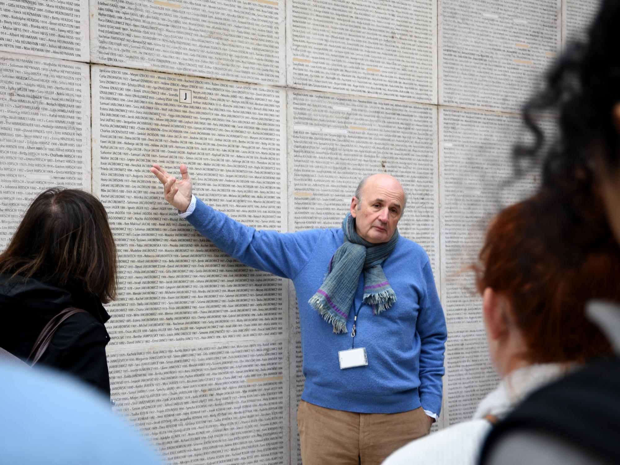 The students visit the Wall of Names in the Holocaust Memorial museum.