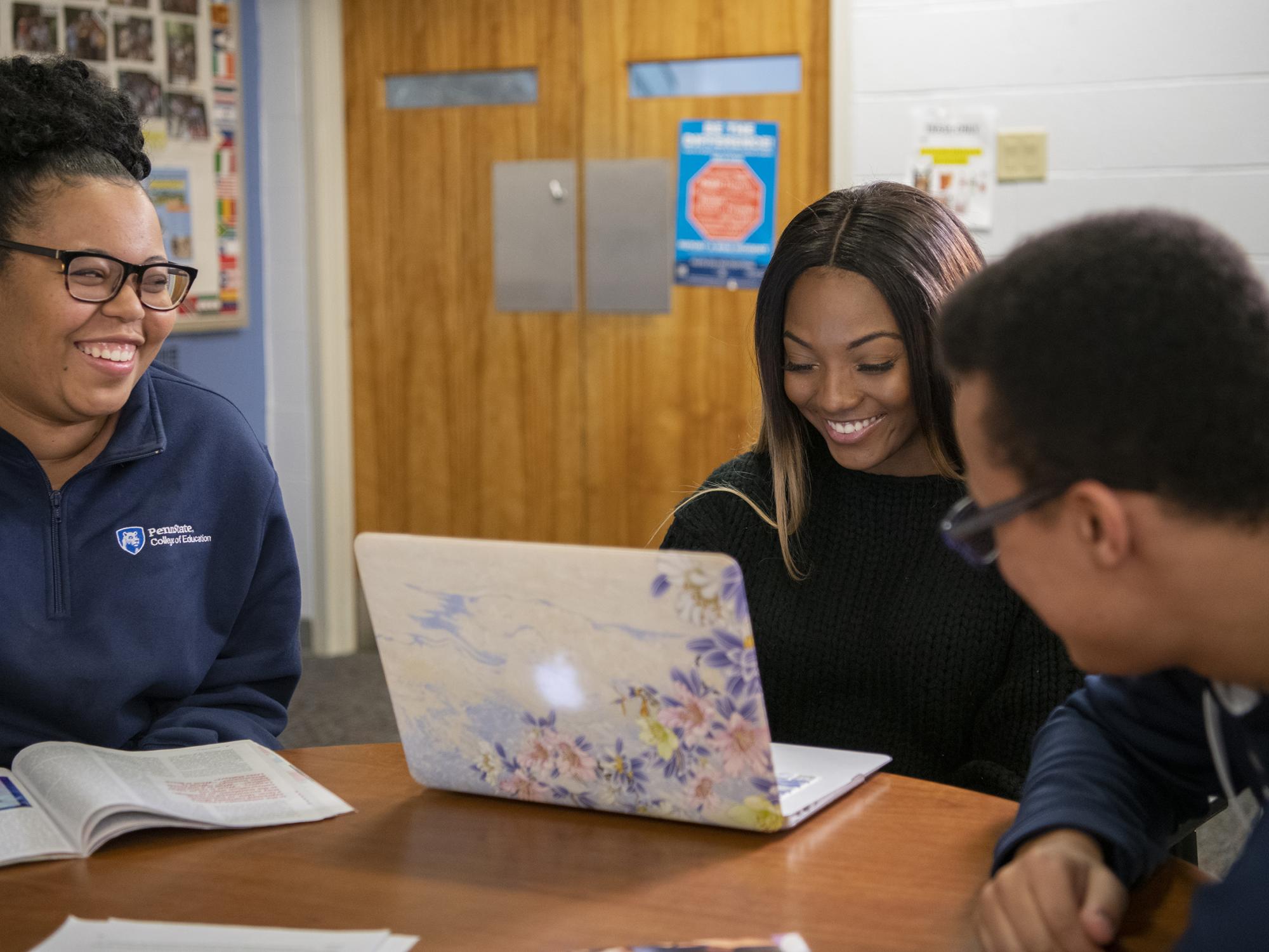 Students interacting in Office of Education and Social Equity
