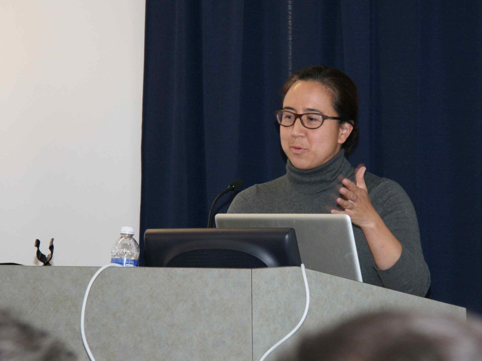 Researcher Rona Halualani gestures as she gives a presentation on Penn State's diversity and inclusion efforts