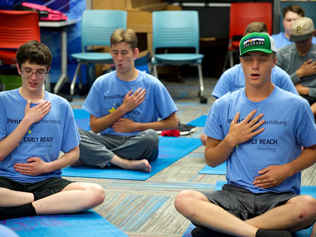 students doing yoga