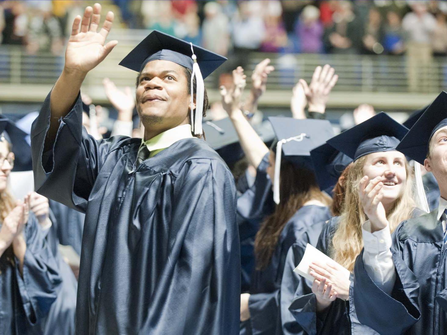 Students waving to family 