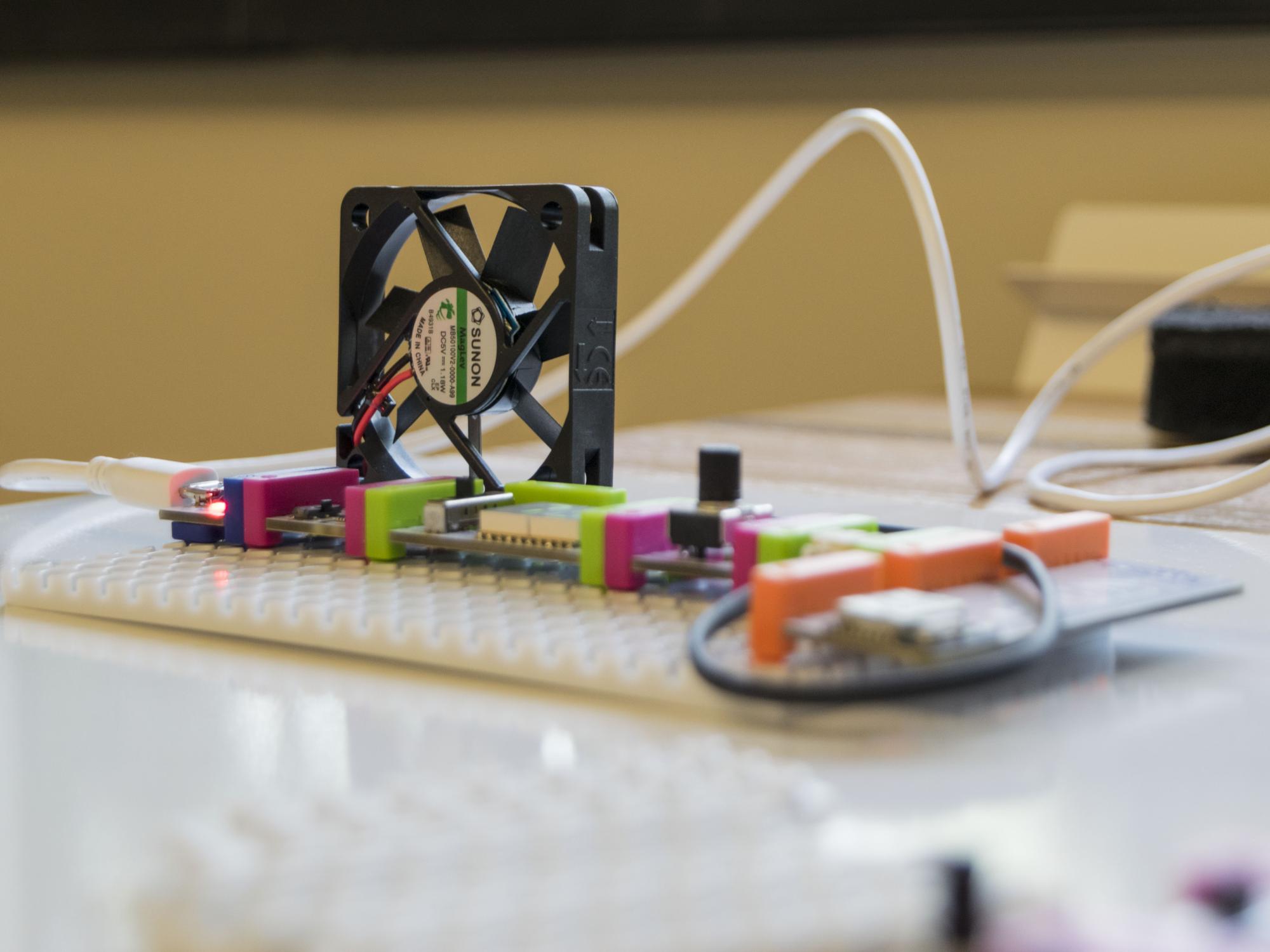Close-up photo of a littleBit fan connected to other bits