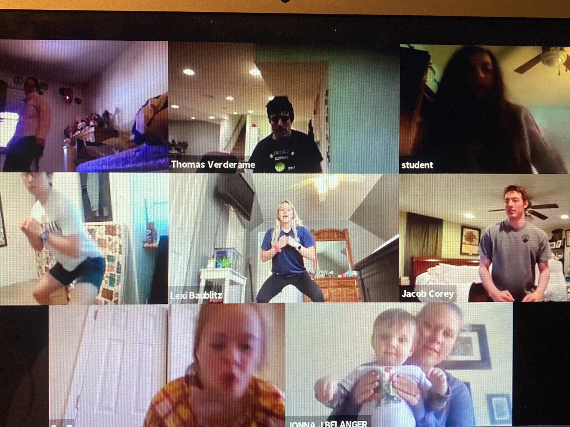 A group of students and student instructors meet together via Zoom for an online fitness course.