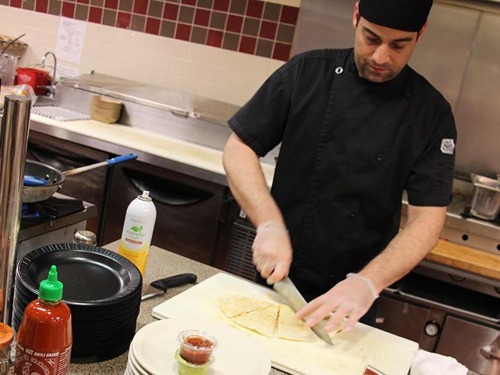 Chef Joe prepares a quesadilla at the new quesadilla bar