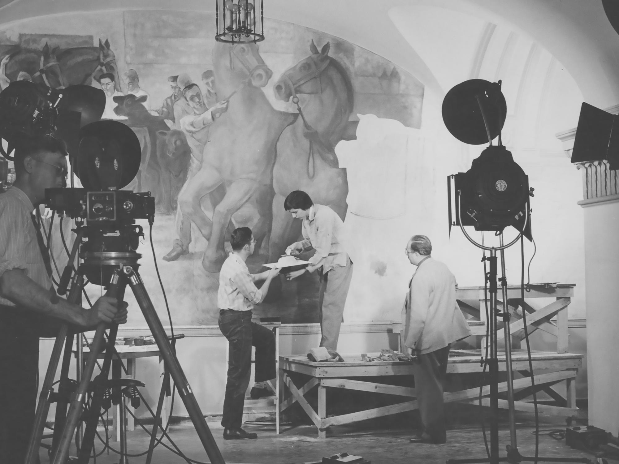 Henry Varnum Poor painting the Land Grant Frescoes