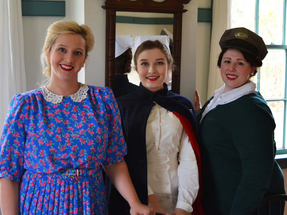 Women dressed in WWII-period clothing