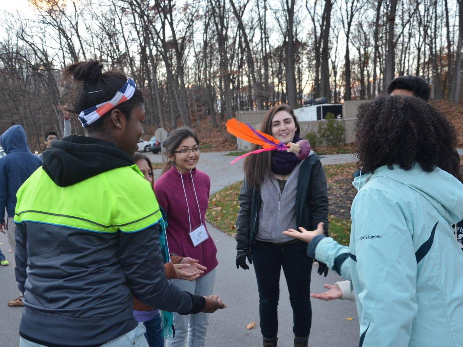 Freshmen Sarah Bastian from State College, Pa., and Sparsh Saxena from New Delhi engage in icebreakers with other participates during the fall 2014 Global Engagement and Leadership Experience.