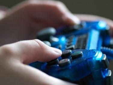 hands holding a game controller