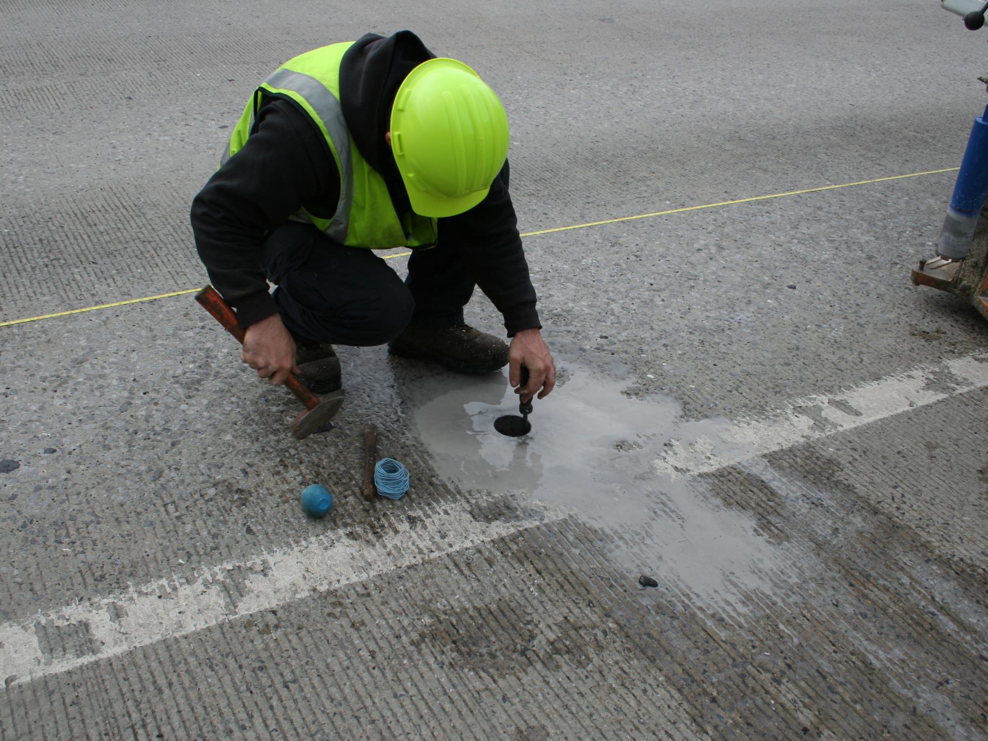 Researcher collecting a core sample for the study.
