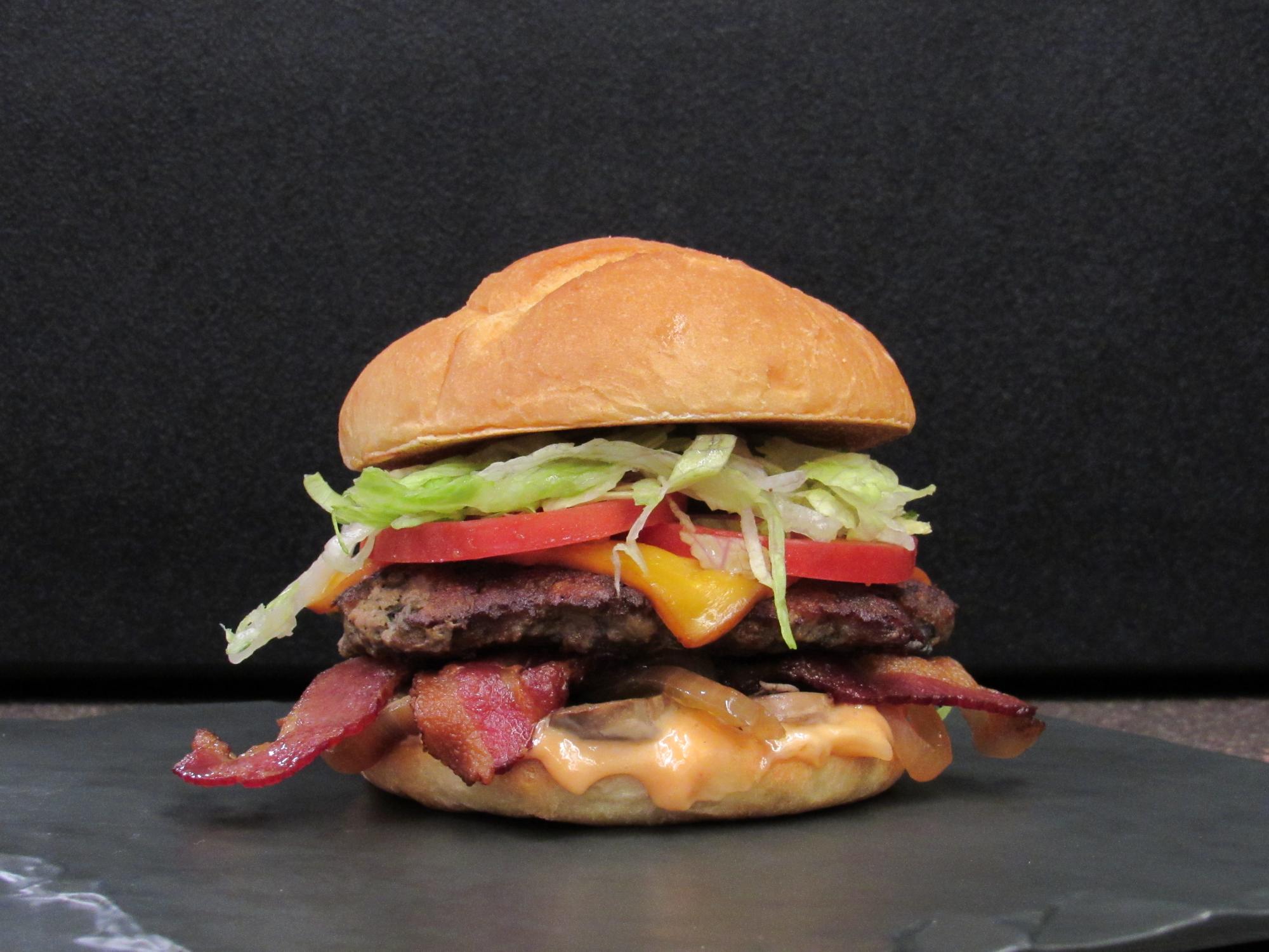A delicious-looking hamburger, the Penn State Burger