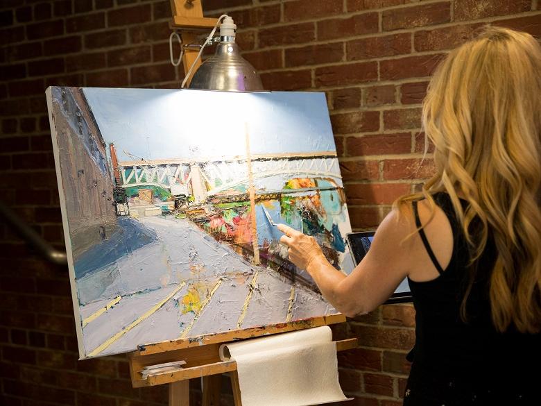 Joyce Werwie Perry paints at the Off the Wall pARTy
