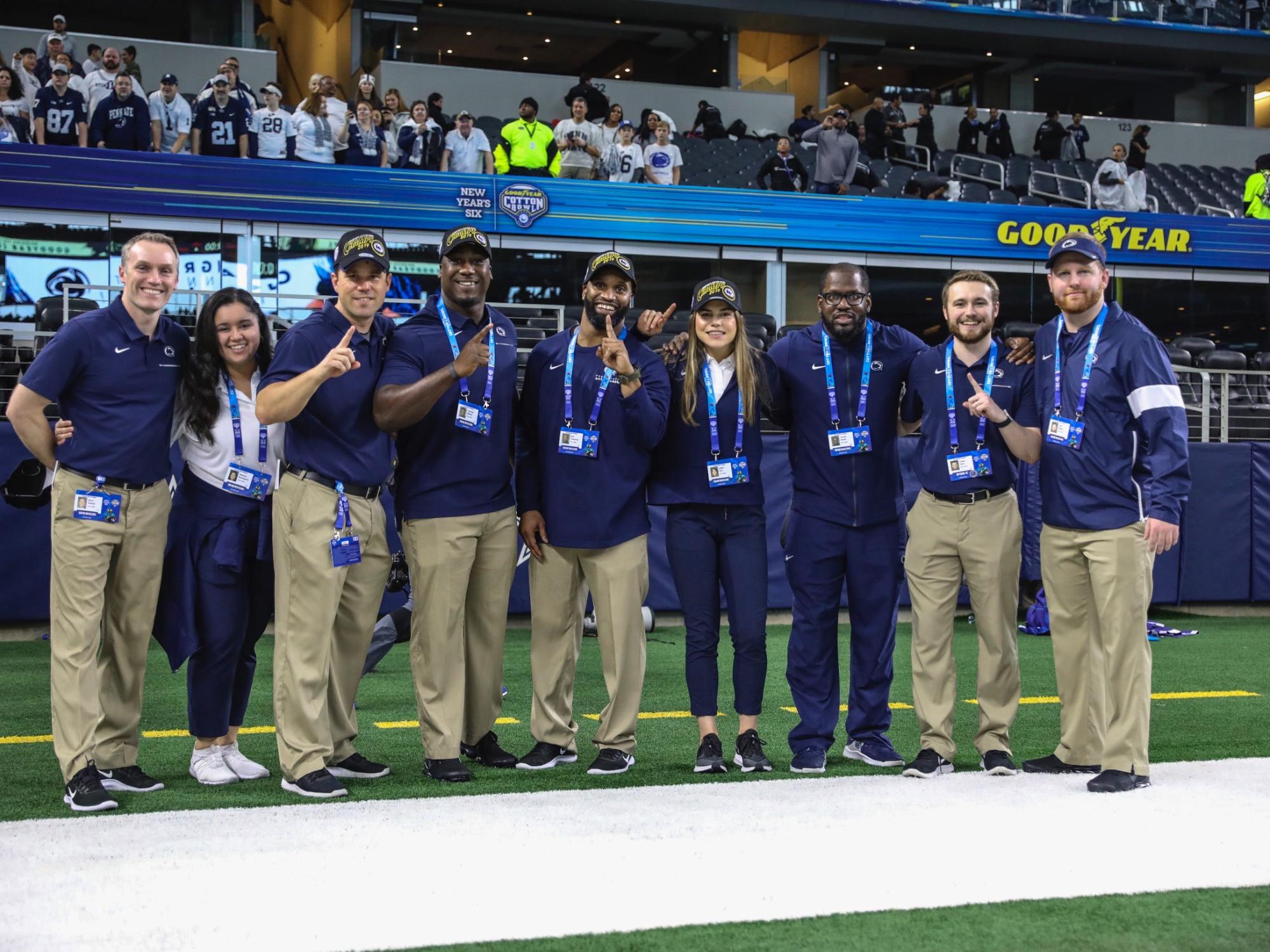 Destiny Rodriguez and the Penn State Football recruiting staff at AT&T Stadium after the Nittany Lion's win at the 2019 Cotton Bowl in Dallas, Texas.