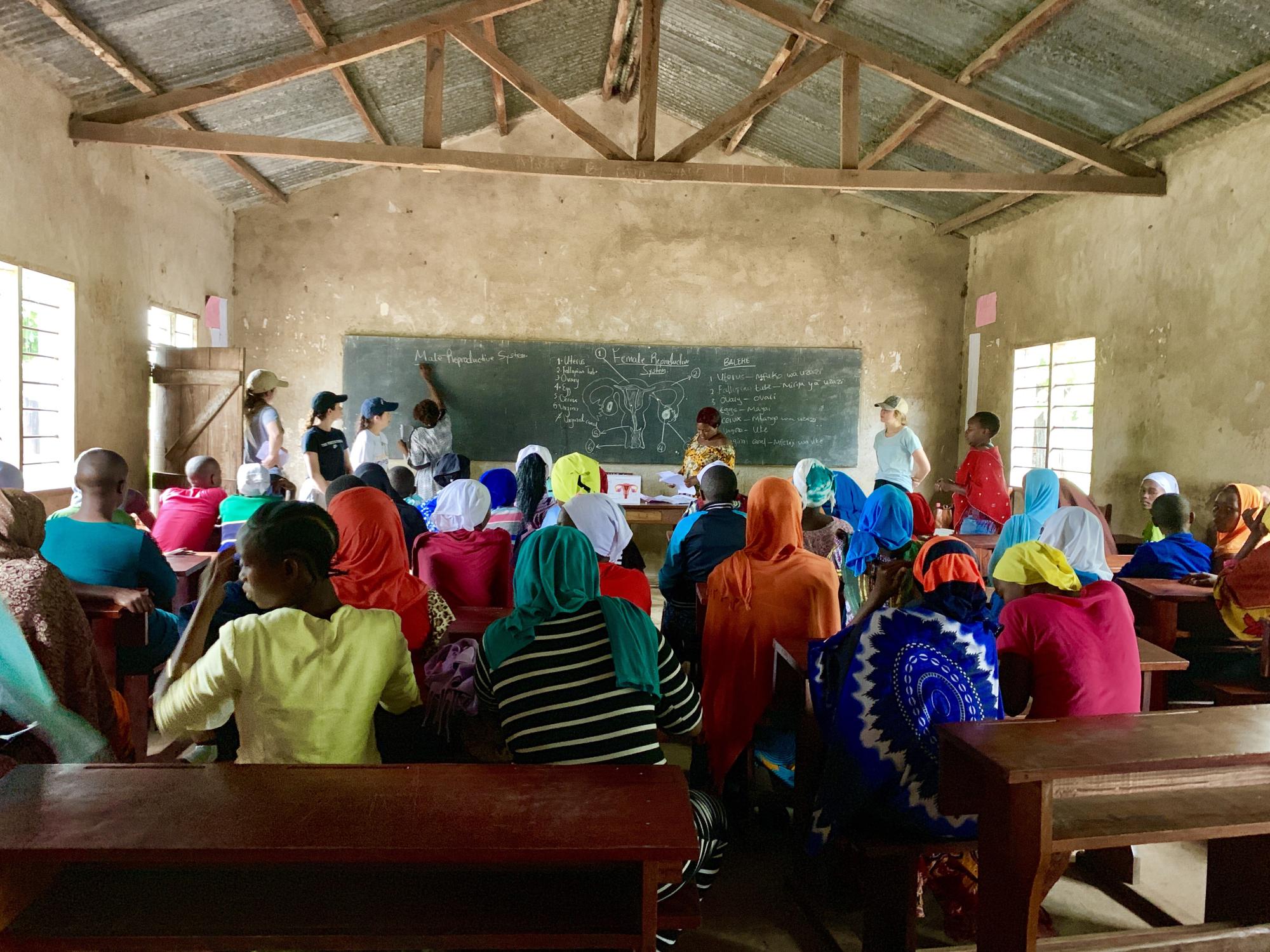 Penn State students giving a presentation on feminine hygiene at the SEGA Girls' School in Morogoro, Tanzania
