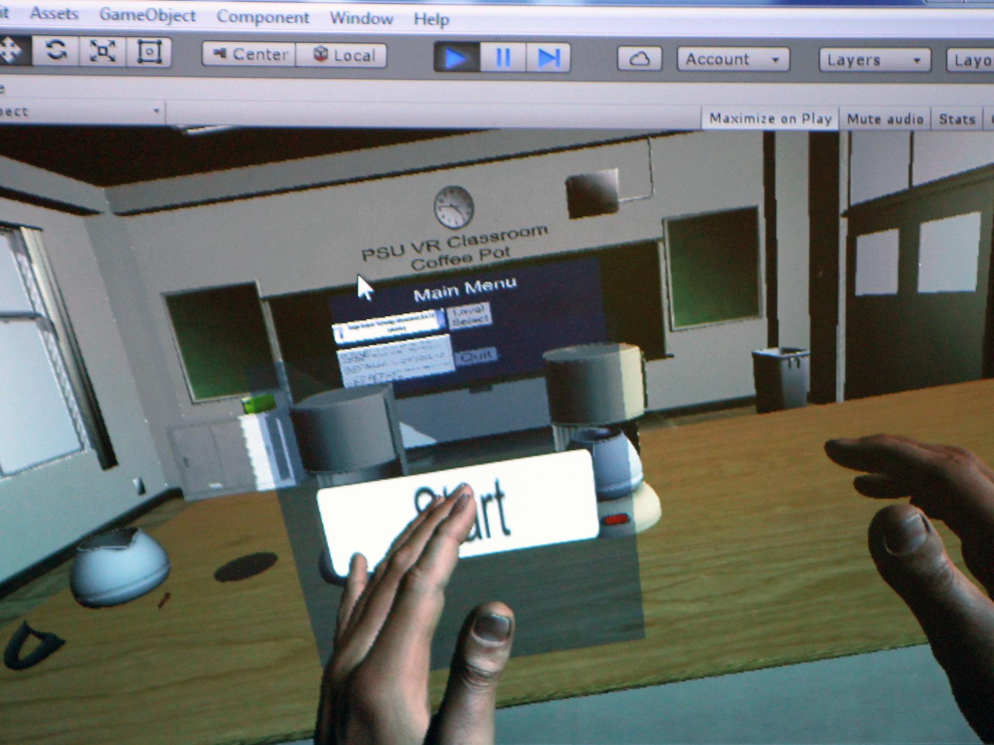 A student engaging in a hands-on activity in the Penn State Virtual Reality Classroom