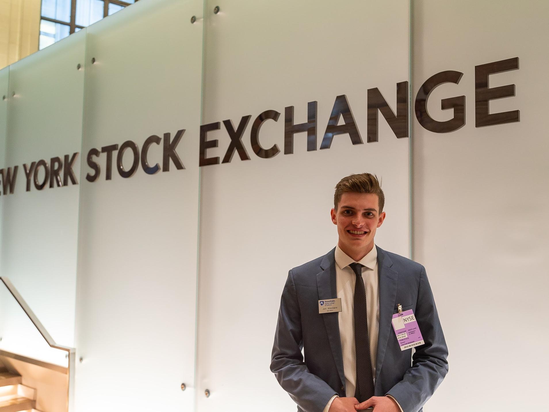 Westlake in front of New York Stock Exchange