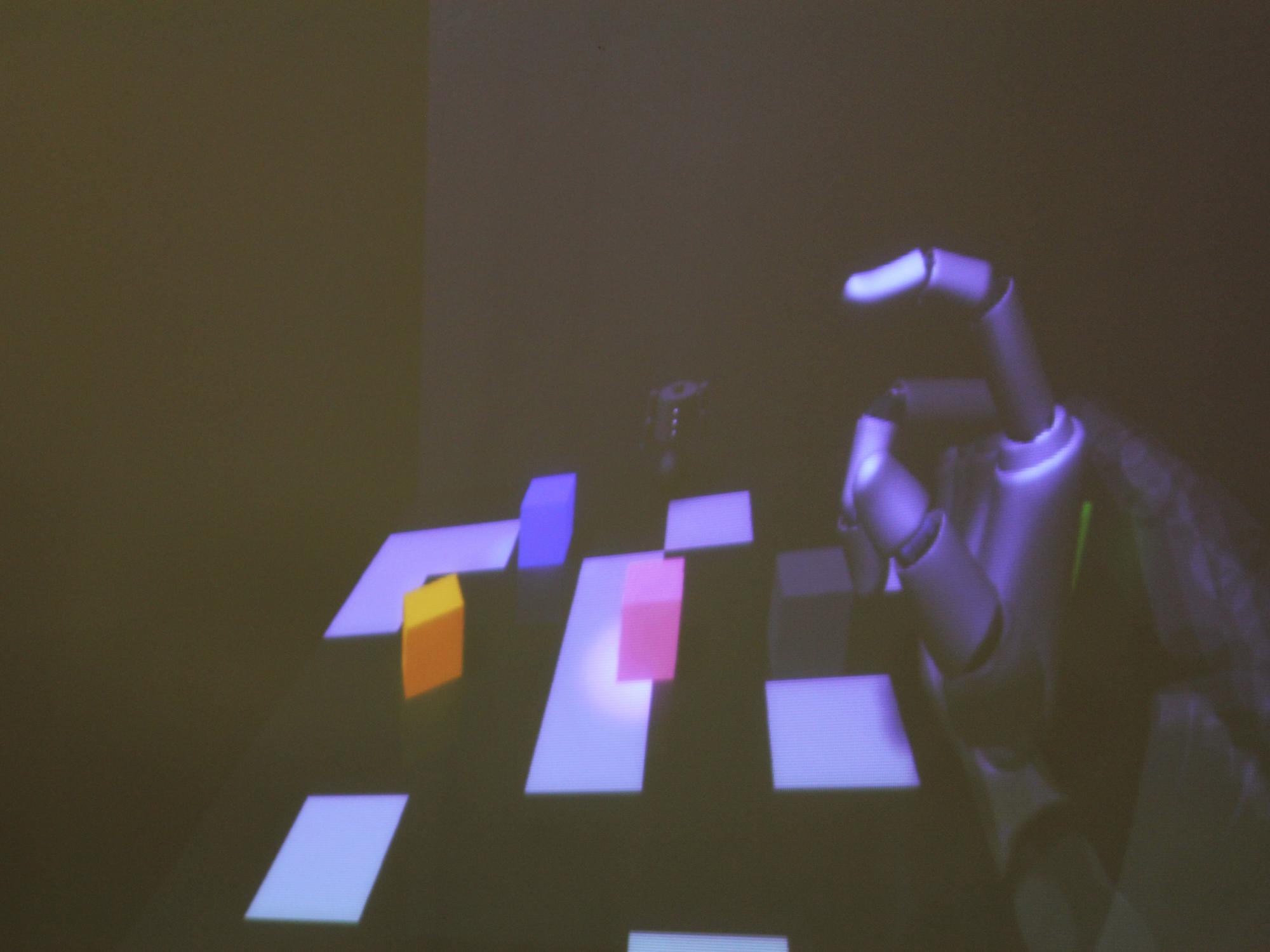A view of what the children saw as they attempted to place a robot's head back on its body using motion-detecting software.