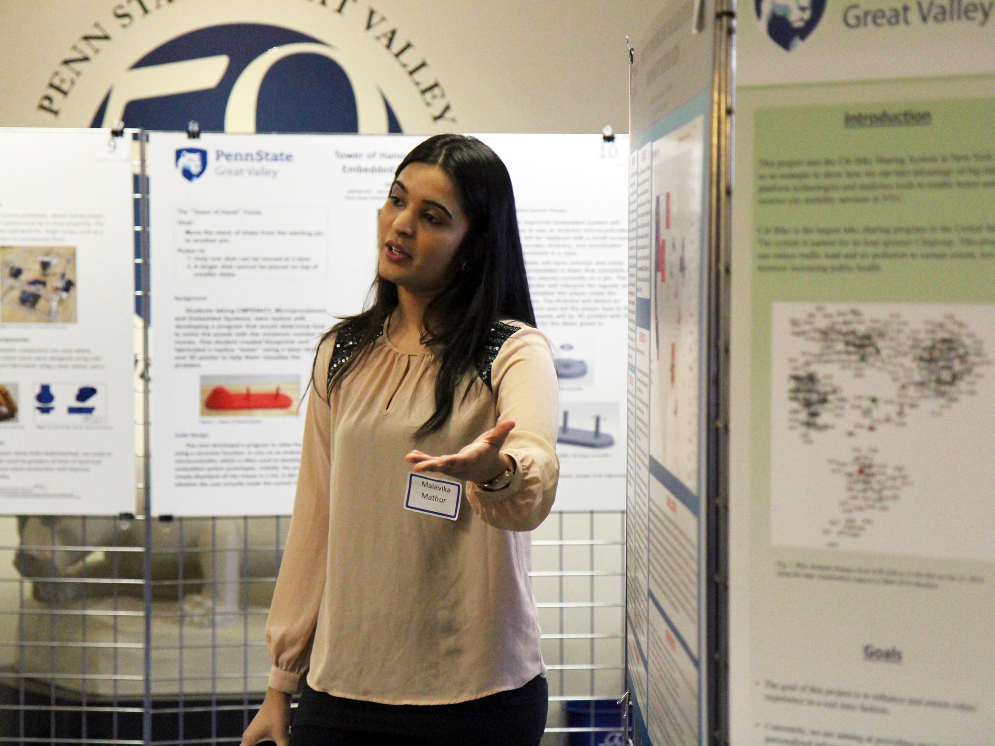 Malavika Mathur presenting poster