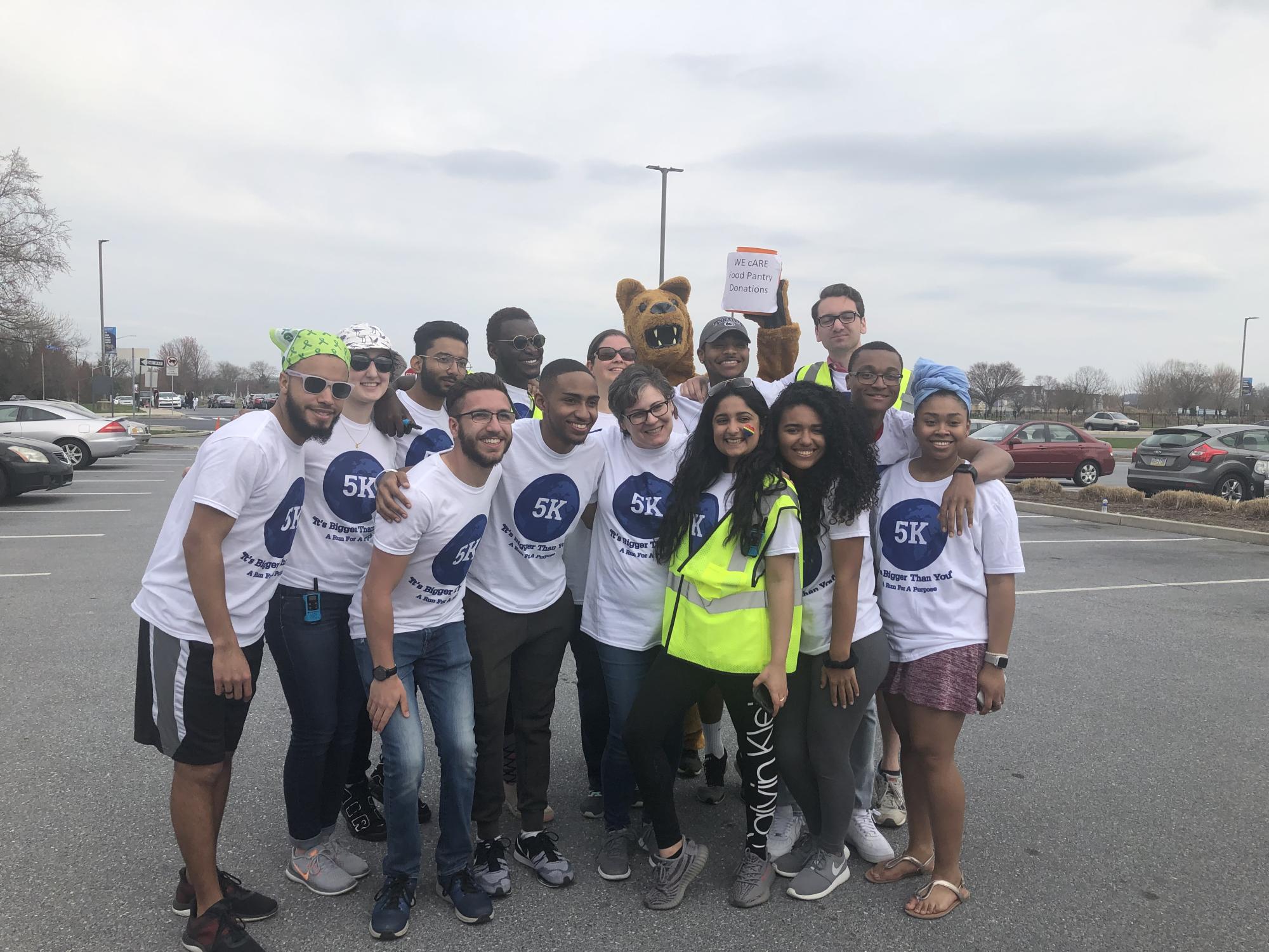 large group of students and Lion