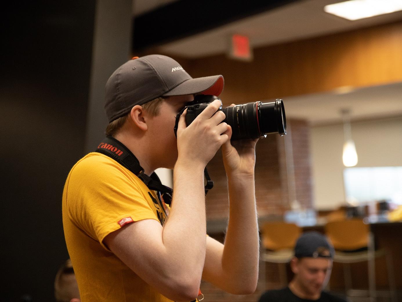 Mackinly Adams taking photographs 