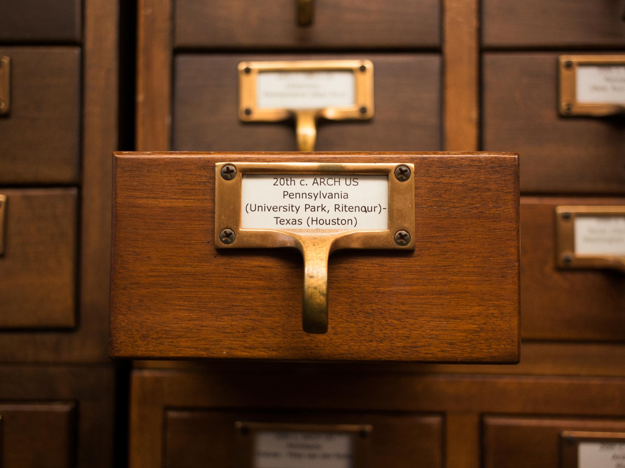 A wooden drawer containing architecture slides from Penn State's University Park campus. 