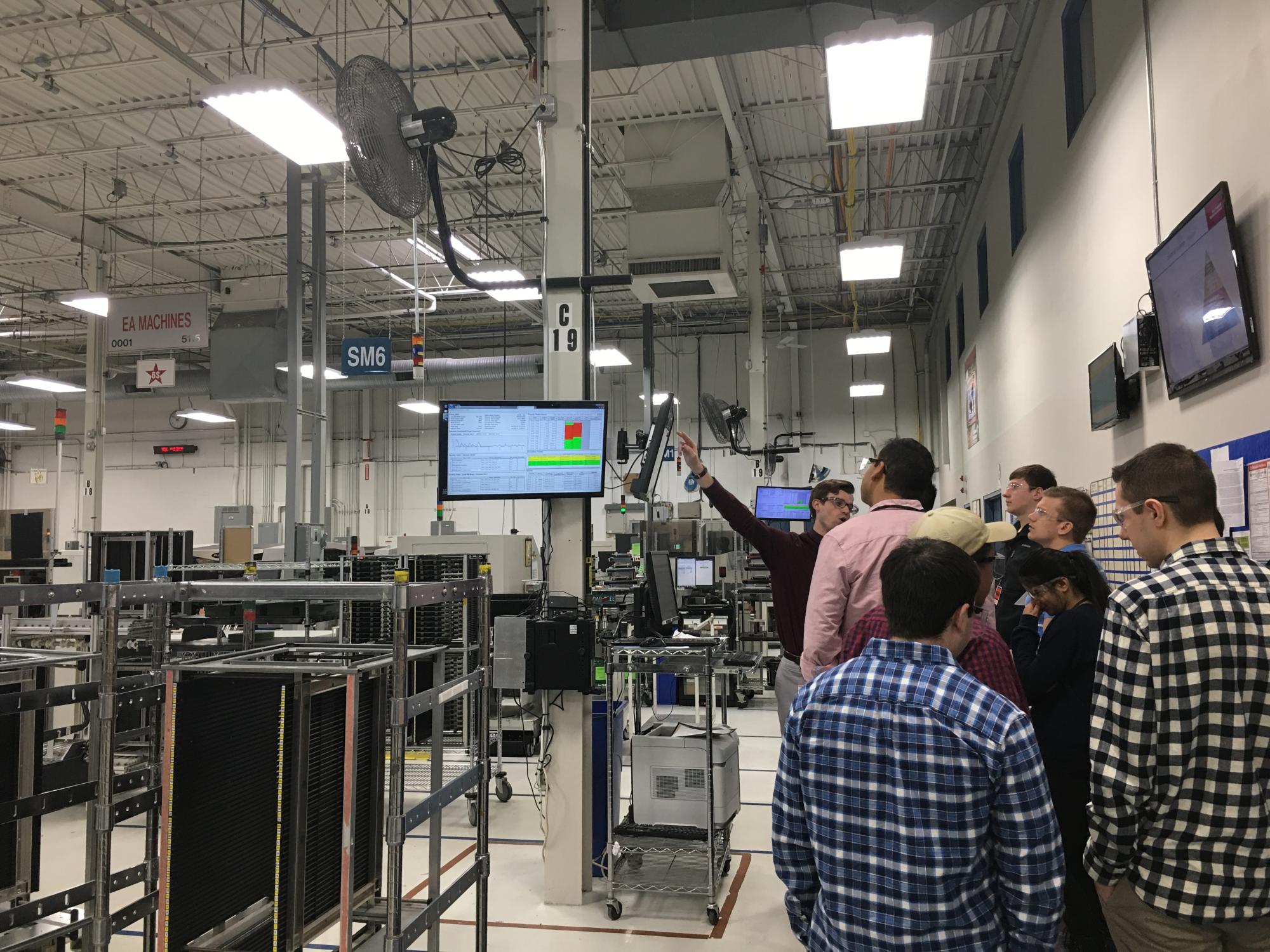 Students learn more about application of smart manufacturing developed by Rockwell Automation during a facility tour