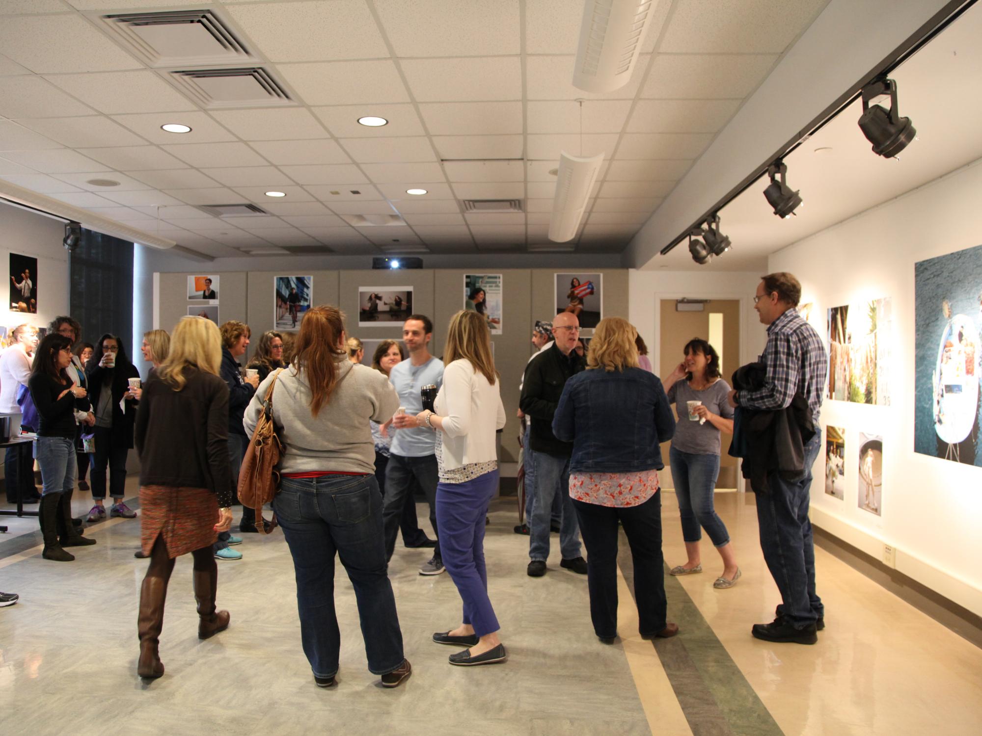 Staff at opening breakfast in "Give Me Your Portrait" exhibition.