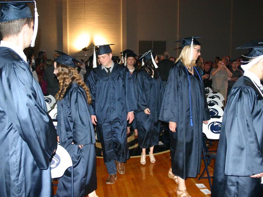 Graduates process to their seats at the start of Commencement 2016.