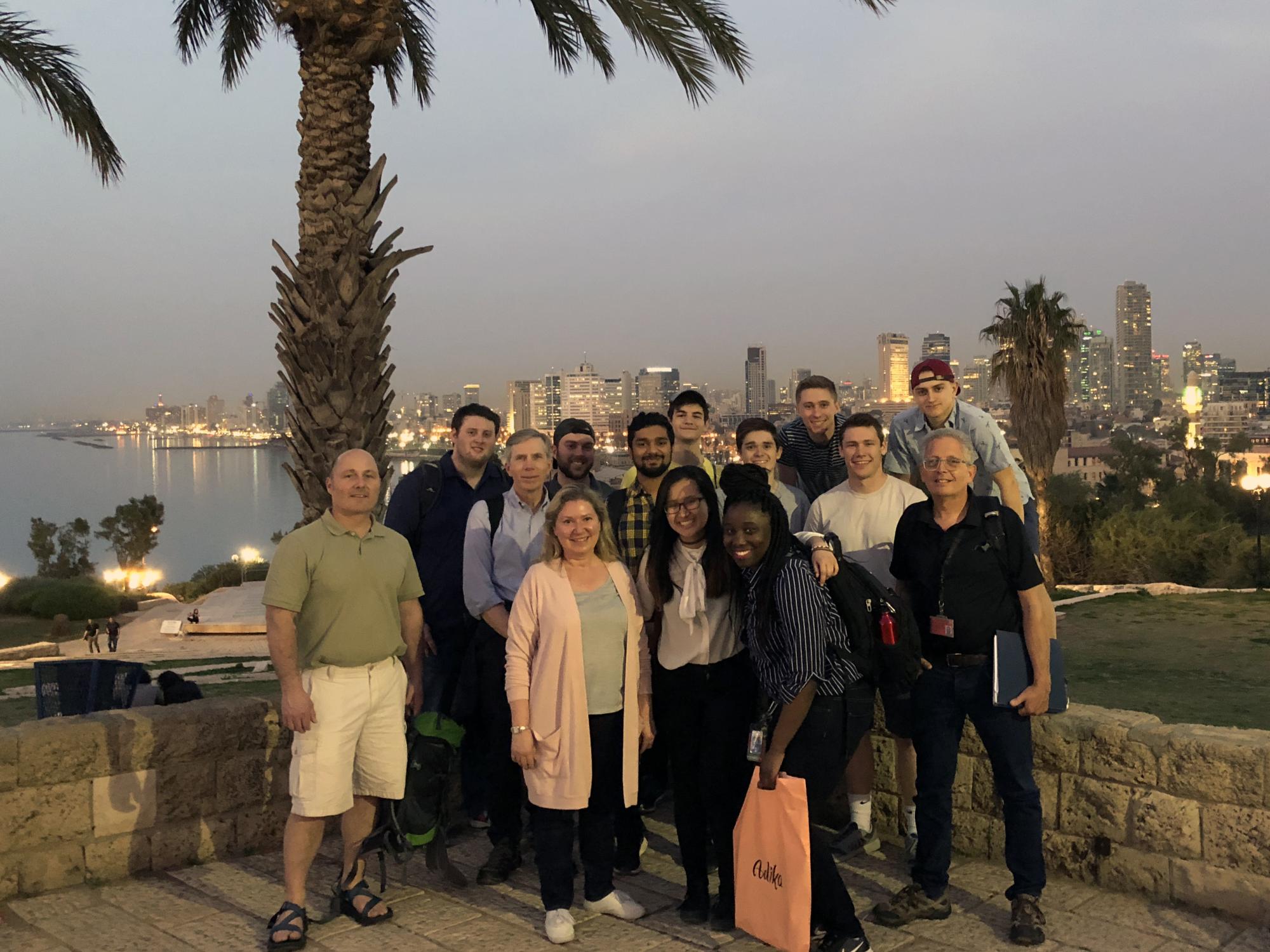 The class, faculty and guide Marc Coles gather after dinner in Jaffa