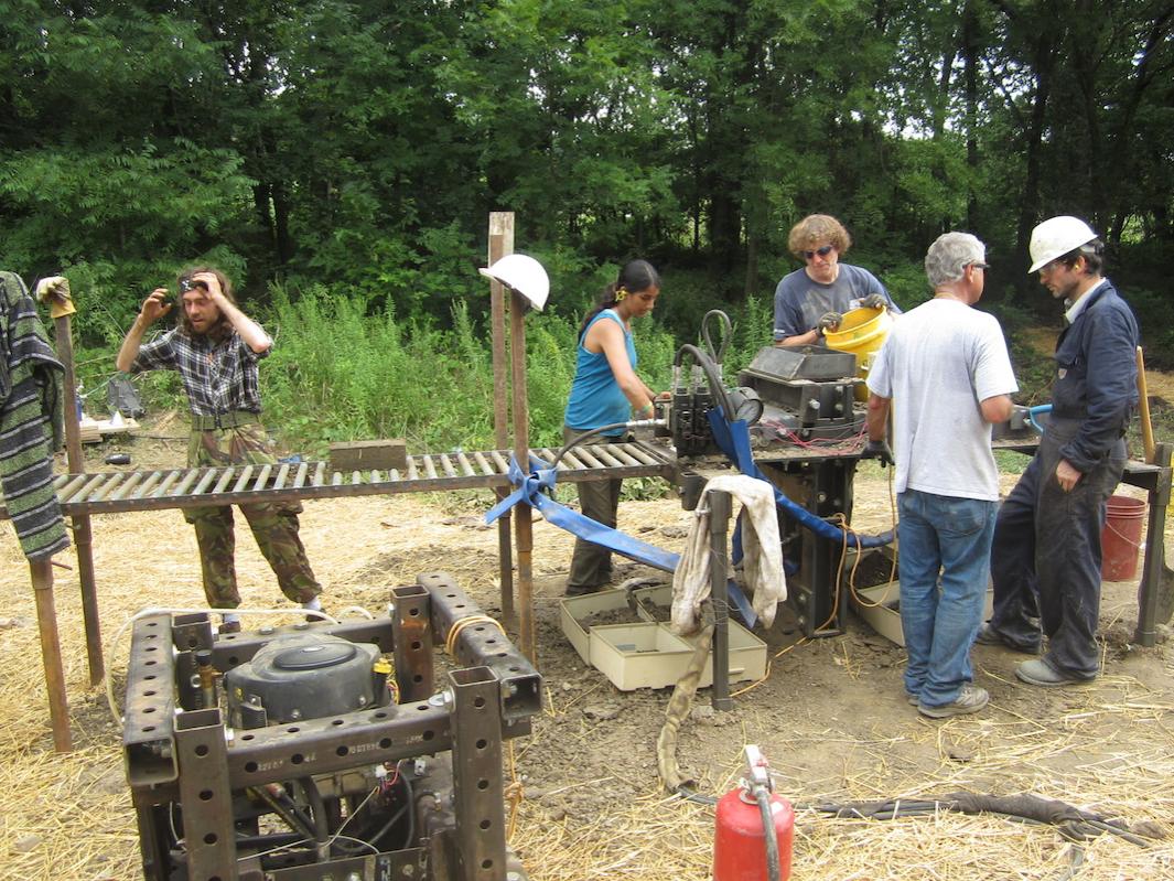 An assembly line for building the Compressed Earth Blocks (CEBs)