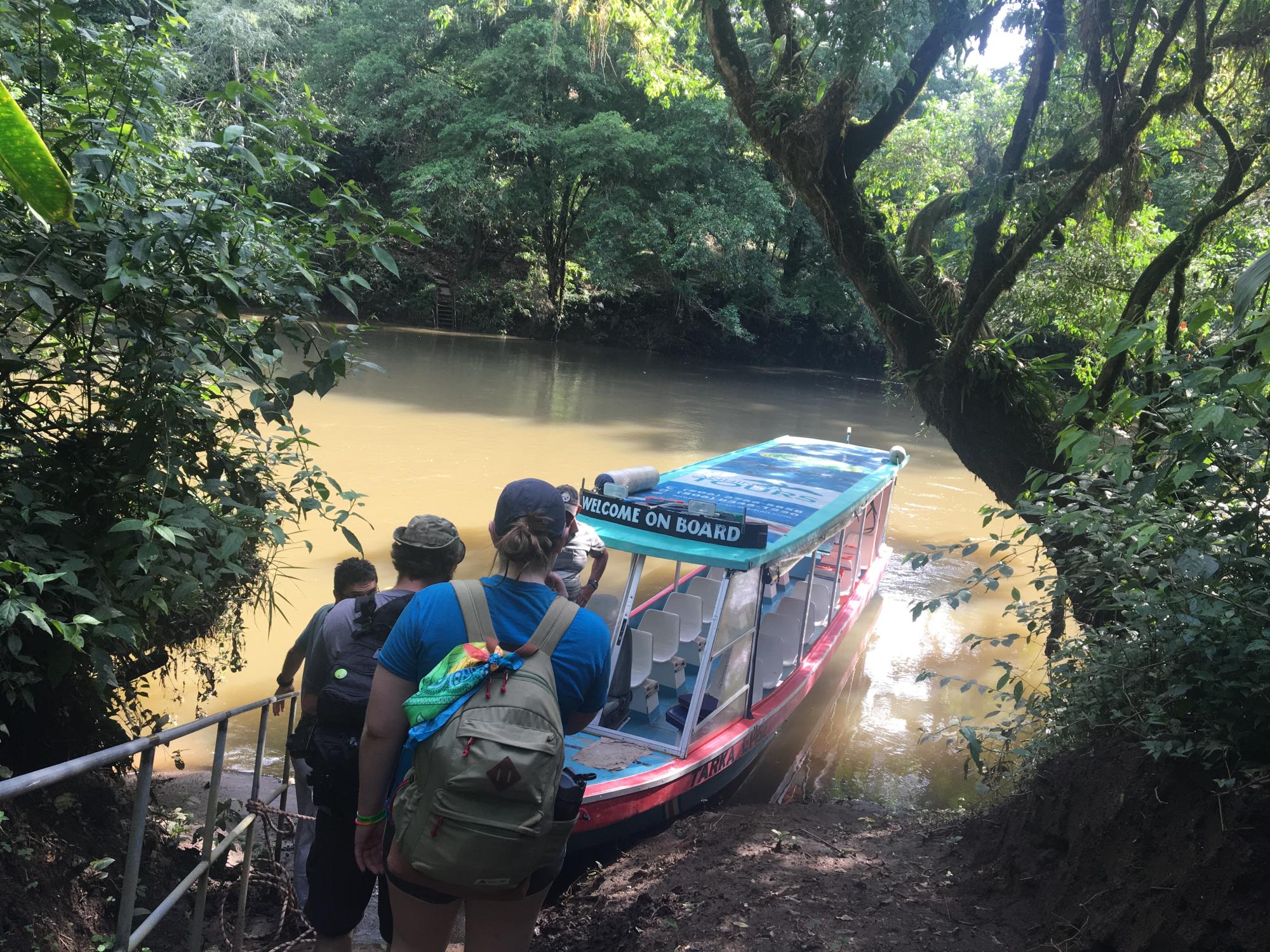 CHANCE students board a boat to float down the Sarapiqui River.