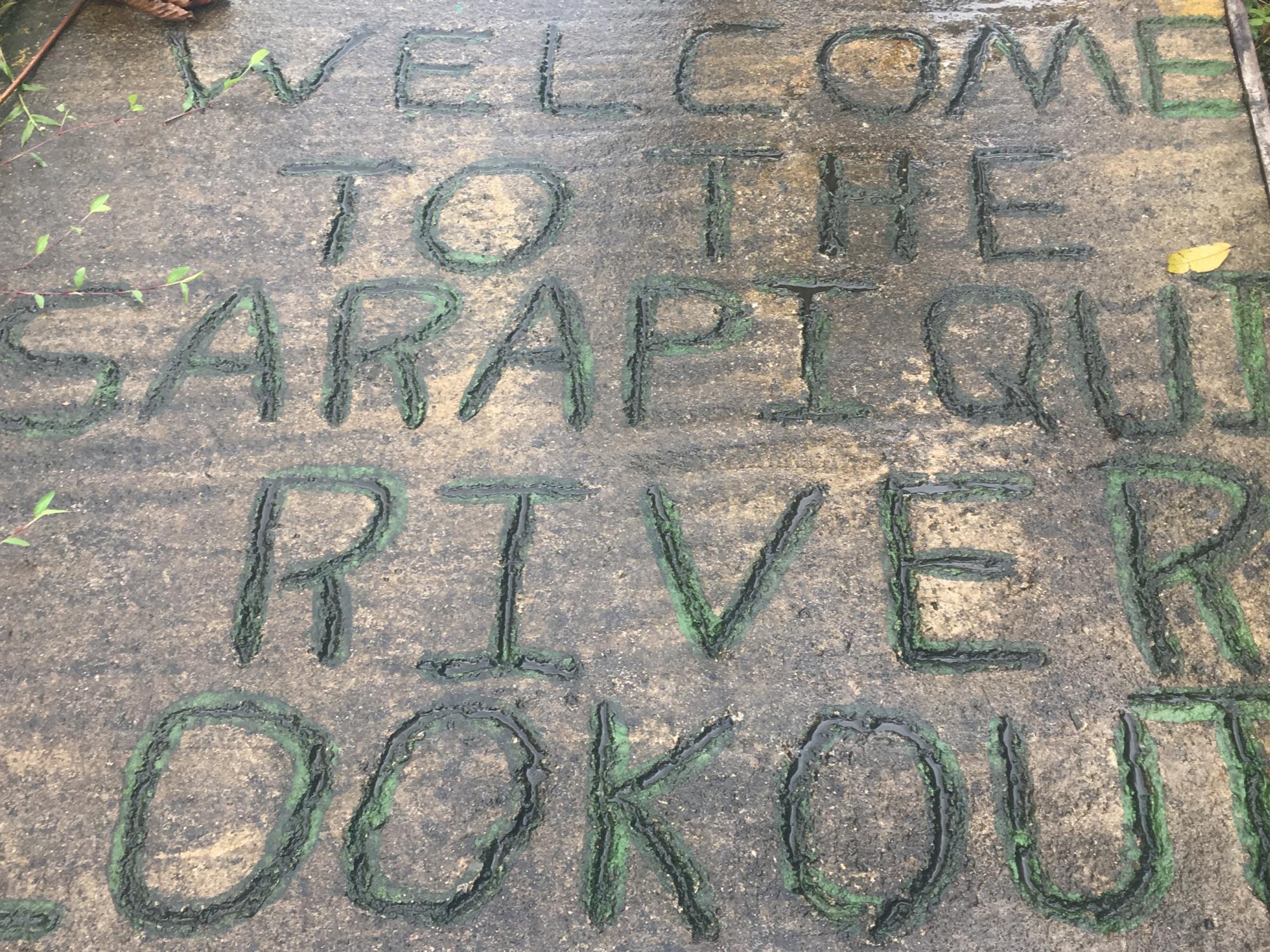 A message in the stone welcomes visitors to the Sarapiqui River lookout.