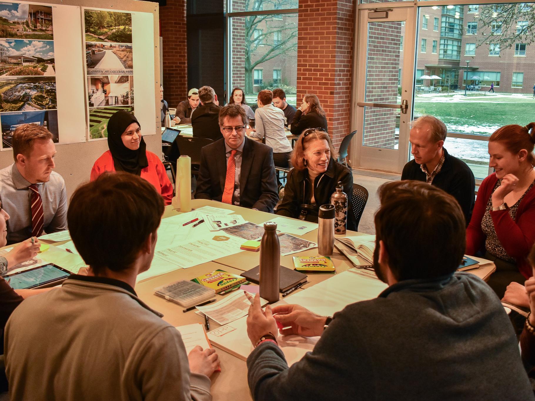 Students from the winning team of Earth, Wind, Inspire at the design charrette for the Sustainability Experience Center
