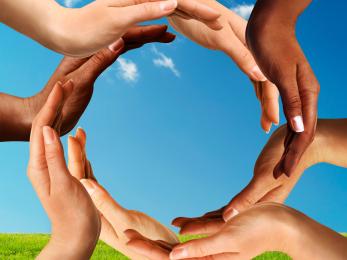 circle multiracial hands