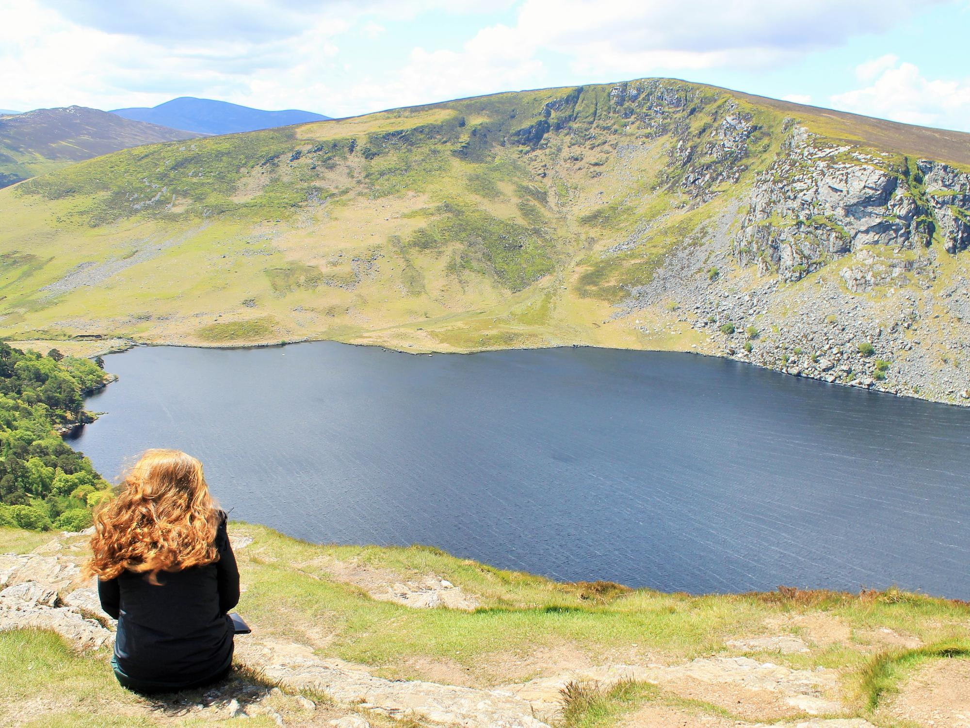 Student looks out over Ireland's Guinness Lake