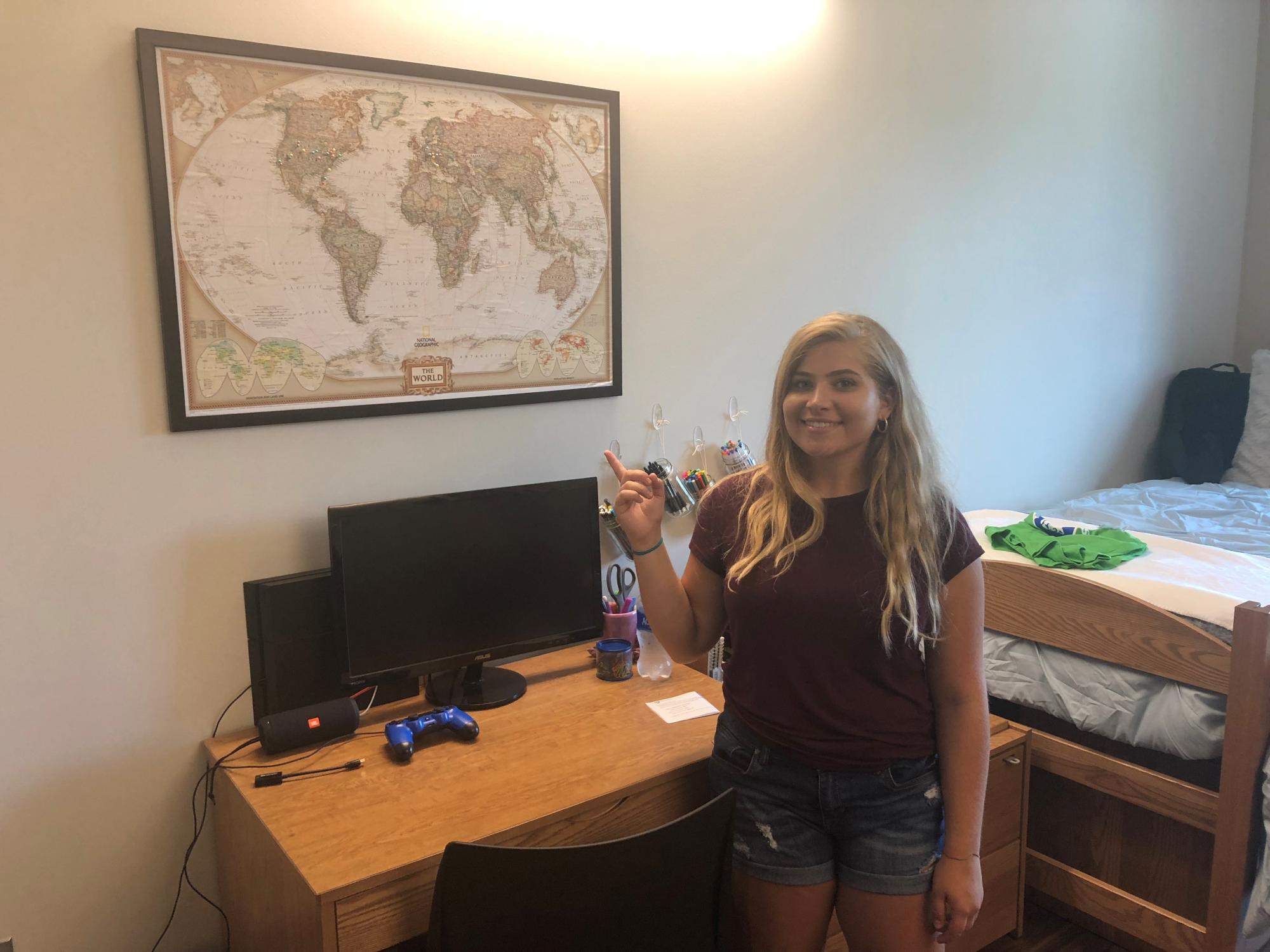 Isabella, from Irwin, Pa., loves to travel, which is why she brought this world map with her to campus. She hopes to continue to fill this map up in the years to come.