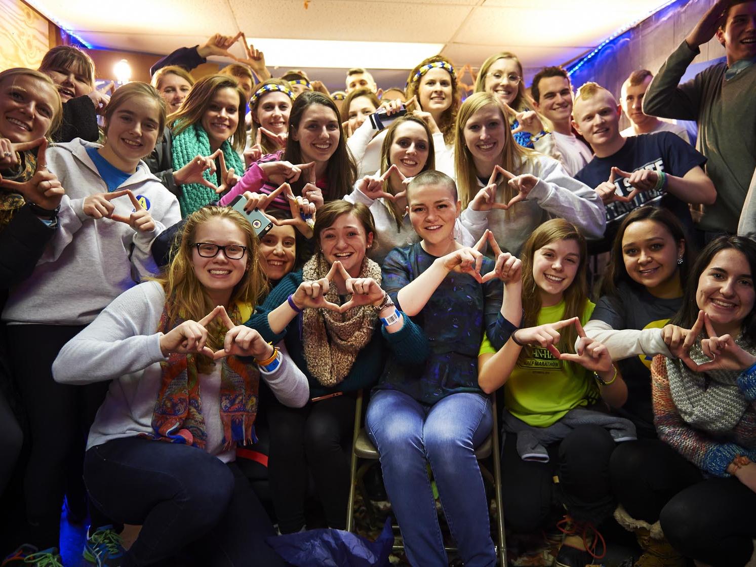 Jenny Dobson with THON group, Apollo, teammates. 