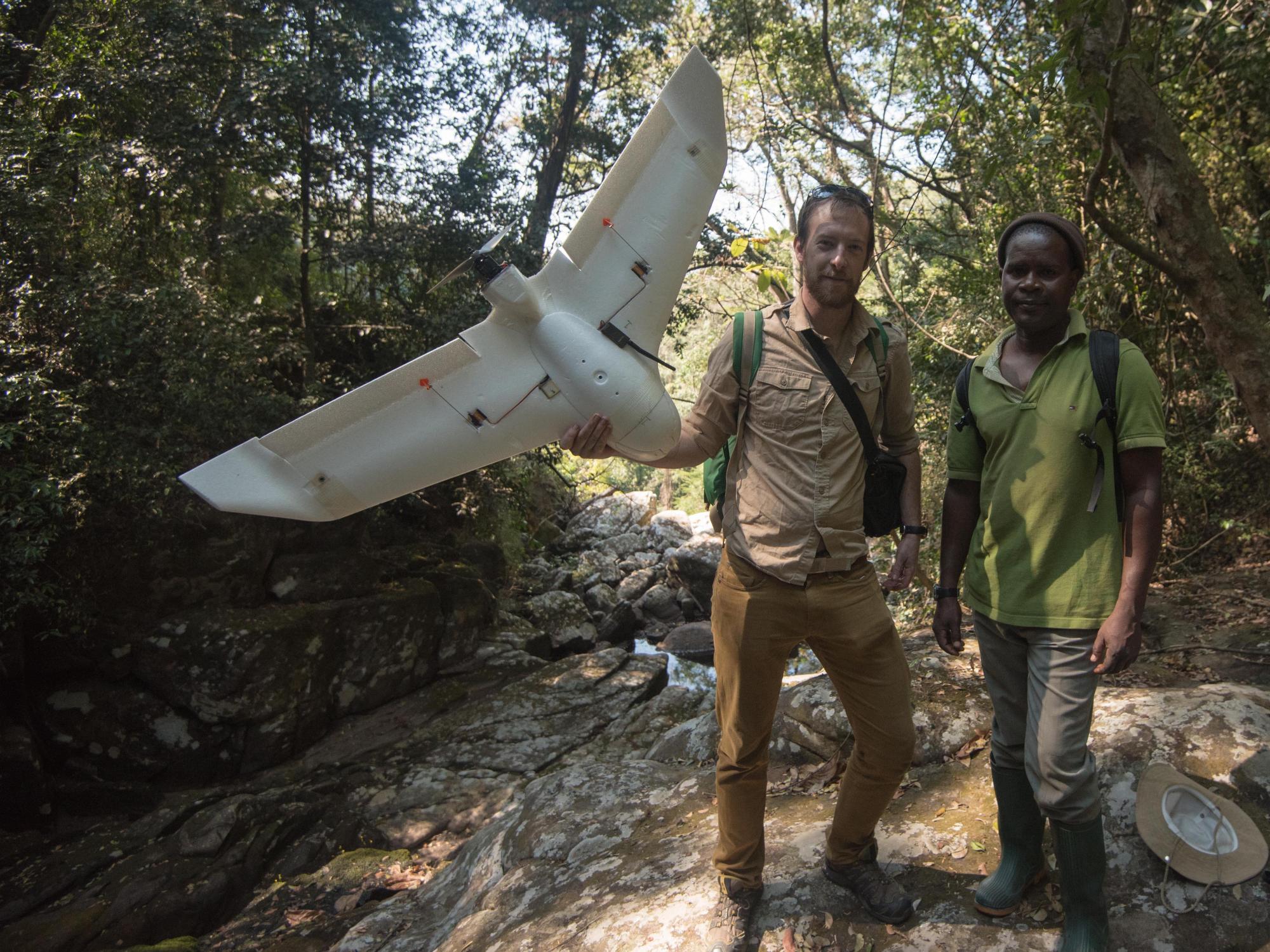 Kerby and assistant in Tanzania