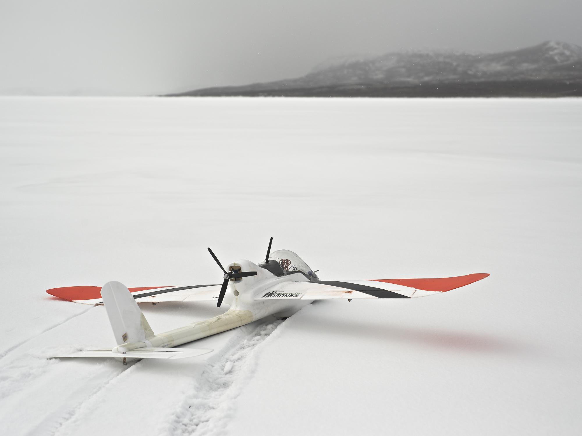 drone landing on frozen lake